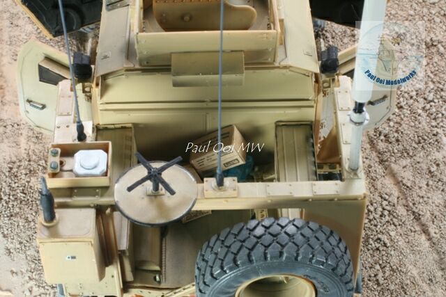 Rear compartment detail: MRE boxes and bottled water pack